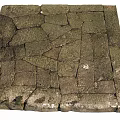 Natural Stone Paved Ground With Moss Covered Irregular Tiles Brownish Gray Textured Surface