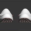 White Leather Loafers Shoes With Brown Accents And Lightweight Sole On Reflective Surface