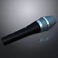 Sleek Handheld Microphone Electronic Device With Black Body Silver Mesh Grill And Metallic Ring