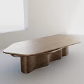 Irregular Metallic Coffee Table With Wave Shaped Base For Modern Living Room