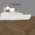 Modern Front Desk Reception With Minetti Sign Receptionist Gray Wall White Flower Vase And Chairs