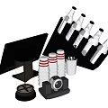 Red And White Striped Cups With Black Holder Coffee Maker And Stirrers On Countertop