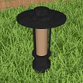 Black Outdoor Lamp With Circular Top And Transparent Shade On Green Grass