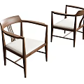 Two Wooden Dining Chairs With Armrests Light Colored Upholstered Seats And Simple Design