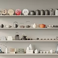 Various Tea Sets Including Teapots Teacups And Caddies Neatly Arranged On Shelves