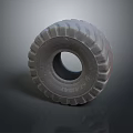 3D Rendered Heavy Duty Tire With Deep Tread Pattern Gray Color And Reflective Surface