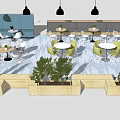 Casual Café Space With Round Tables Green White Chairs And Black Pendant Lights