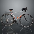 White Road Bike with Black Handlebars Rear Rack and Orange Accents
