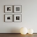 Abstract Paintings With Four Framed Black And White Artworks Hanging On Wall