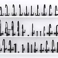 Assorted Faucet Designs Showcased on White Shelves in Display Collection