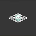 Elegant Green Gemstone Ring With Silver Band And Sparkling Diamond Accents