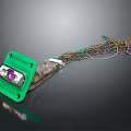Mobile Digital Component With Green Enclosure Purple Lens And Multicolored Cables