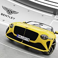 Bentley Yellow Convertible Car Featuring Open Top Design And Stylish Wheels