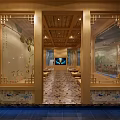 SPA Sauna Interior With Stone Walls Wooden Table Cushions And Green Plants