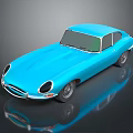 Bright Blue Classic Sports Car With Sleek Body And Reflective Surface