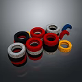Colorful Circular Rings in Different Colors Stacked Together Against Black Landscape Background