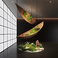 Indoor Landscape Featuring Hanging Bamboo Boat Shapes With Green Moss And White Grid Wall