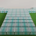 Transparent Glass Floor Structure on Green Grass Lawn with Metal Frame and Neatly Arranged Panels