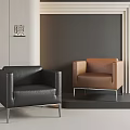 Modern Single Sofa With Black And Brown Leather Upholstery And Metal Legs