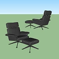 Stylish Black Leisure Chair with Rivet Detailing and Matching Ottoman on Metal Spider Leg Base