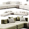 Beige Fabric Double Sofa With Checkered Pillows Cozy Throw Blanket And Ottoman