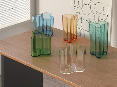 Colorful Geometric Glass Vases Arranged On Wooden Table With Window Blinds And Geometric Wall Art 3d model