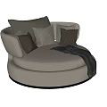 Modern Beige Upholstered Single Sofa With Curved Arms Throw Pillows And Soft Blanket