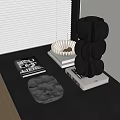 Black Inflatable Multi Layer Vase With White Wave Tray And Books On Table