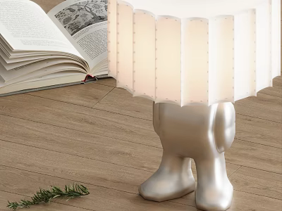 Table Lamp With White Pleated Lampshade Silver Humanoid Base And Open Book On Wooden Floor 3d model