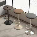 Modern Bar Stools With Brown Beige Gray Seats And Metallic Bases In Interior Room