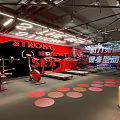 Modern Gym Interior With Red Fitness Equipment And Neon Lights