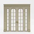 Light Colored Double Doors With Arched Glass Panes And Golden Handles