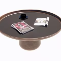 Modern Round Coffee Table With Dark Top Cylindrical Base And Magazines 3d model