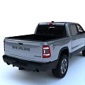 Silver RAM Crew Cab Pickup Truck With Modern Front Grille And Off Road Tires