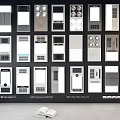 Various Home Control Panel Designs Arranged On Black Wall With Open Book 3d model
