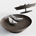 Two Modern Round Wooden Coffee Tables With Silver Boat Decorations