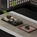 Elegant Tea Trays With Green Teapot Plant And Minimalist Table Setting