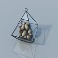 Glass Pyramid Shaped Decorative Ornament With Metal Frame Acorns Inside On Smooth Surface And Reflection