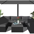 Outdoor Wicker Sofa Setup With Coffee Table Umbrella And Green Plants 3d model