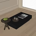 Modern Black Coffee Table With Glass Cups Magazine And Small Round Table In Bright Room
