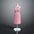 Man Modeling Pink Polka Dot Halter Dress on White Mannequin Stand