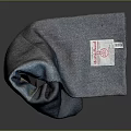 Blue Folded Scarf with Brand Label and Soft Quality Fabric Texture