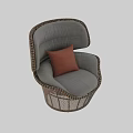 Modern Wicker Leisure Chair with Light Gray Cushion and Pink Pillow