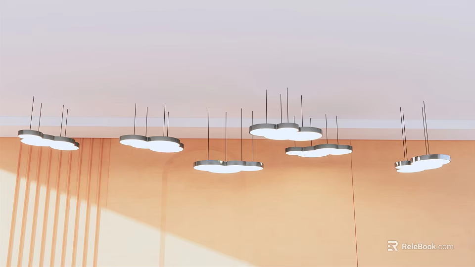 Cloud shaped white pendant lights hanging from ceiling with light colored wall and natural light 3d model 