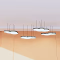 Cloud shaped white pendant lights hanging from ceiling with light colored wall and natural light