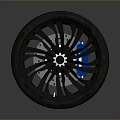 Car Tire Featuring Black Spoke Alloy Wheel And Radial Tread Design