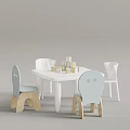 Children's Play Table With Light Blue Chairs And Wooden Building Blocks