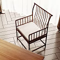 Comfortable Accent Chair With Wooden Frame And Light Cushion On Herringbone Floor With White Curtains