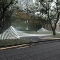 Modern Garden Landscape With Illuminated Geometric Patterns Trees Grass And Paved Pathways