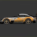 Sleek Silver And Orange Modified Sports Car With Rear Spoiler And Alloy Wheels